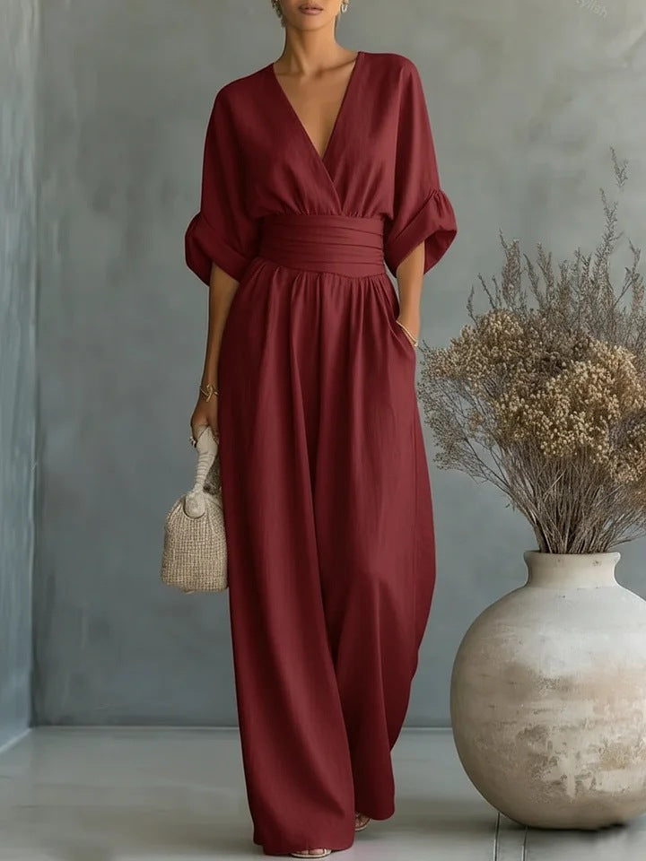 Combinaison femme chic col en V jambes larges coupe fluide manches courtes élégante