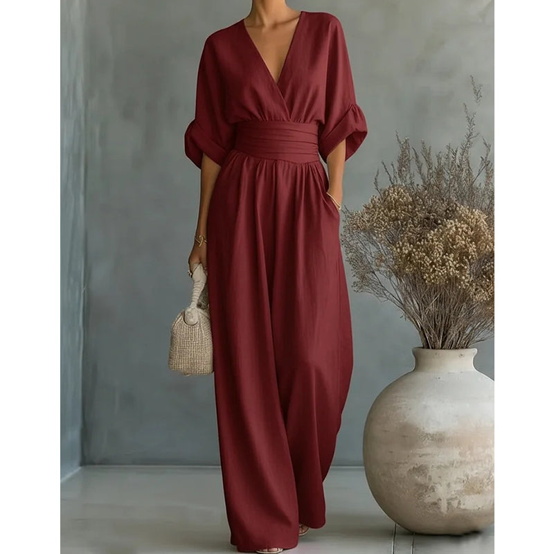 Combinaison femme chic col en V jambes larges coupe fluide manches courtes élégante
