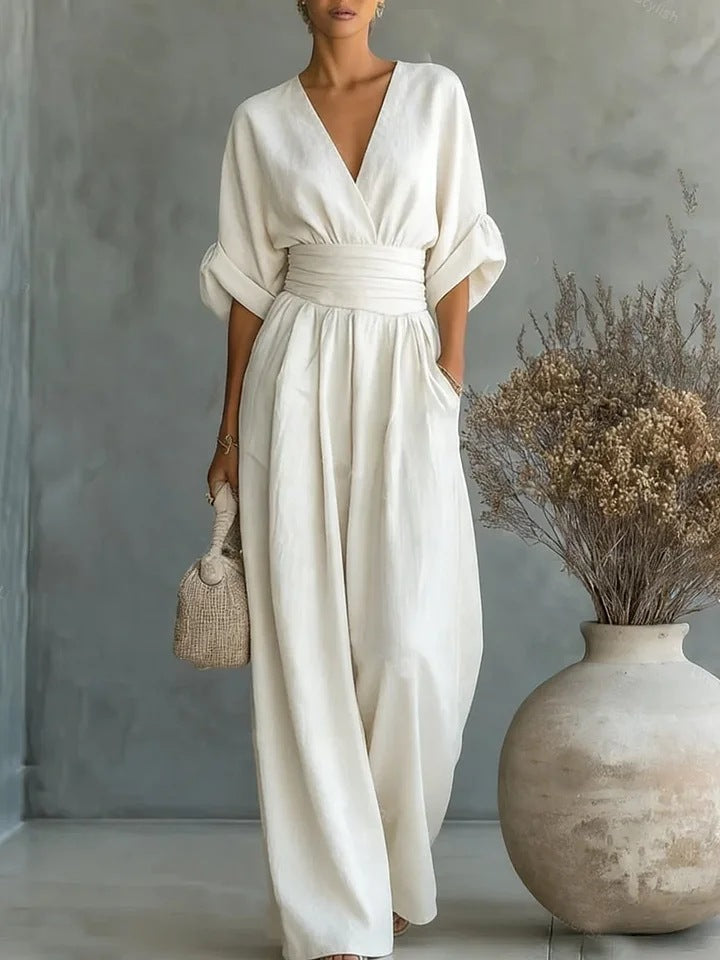 Combinaison femme chic col en V jambes larges coupe fluide manches courtes élégante