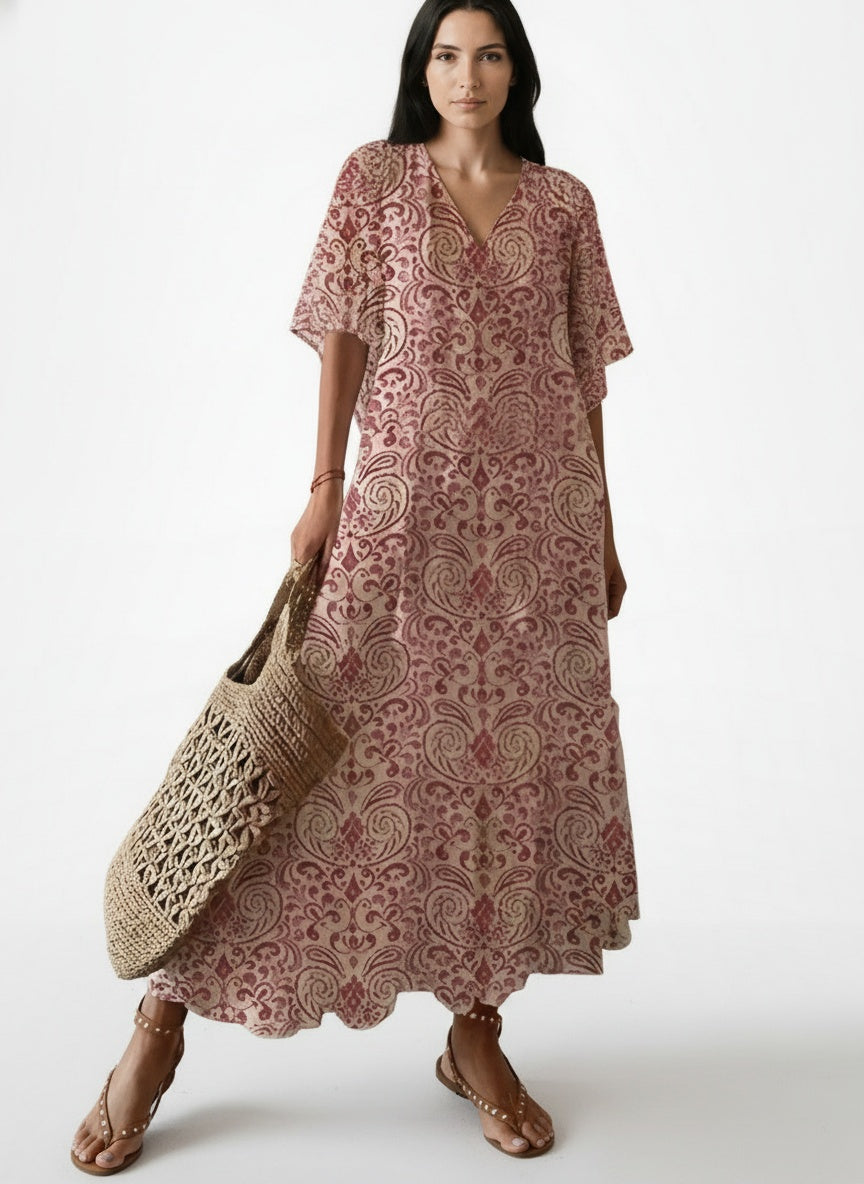 Full body view of the model wearing Robe midi légère imprimée femme