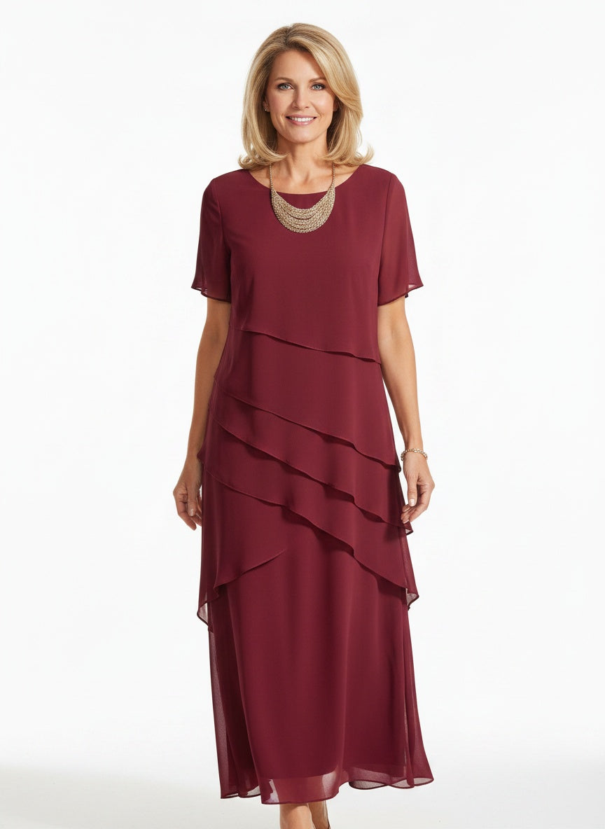 Full body view of the model wearing Robe midi en chiffon à volants femme