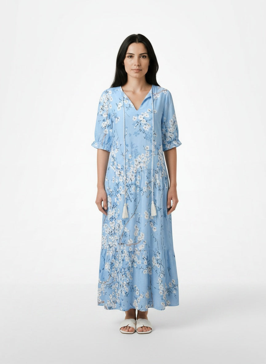 Full body view of the model wearing Robe midi à imprimé floral et col en V femme