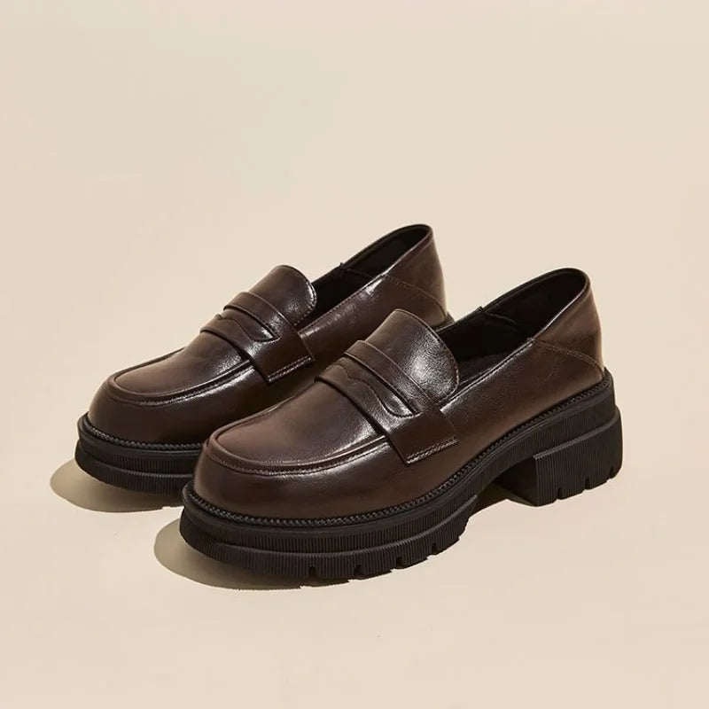 Mocassins femme à plateforme crantée et bride 1