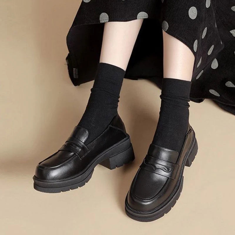 Mocassins femme à plateforme crantée et bride 6