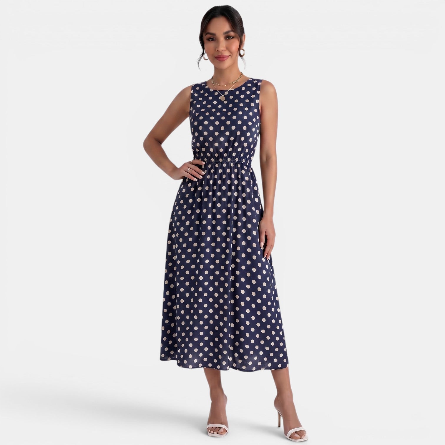 Robe midi à pois d'été sans manches à col rond et coupe trapèze