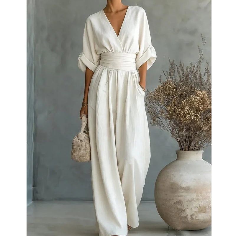 Combinaison femme chic col en V jambes larges coupe fluide manches courtes élégante