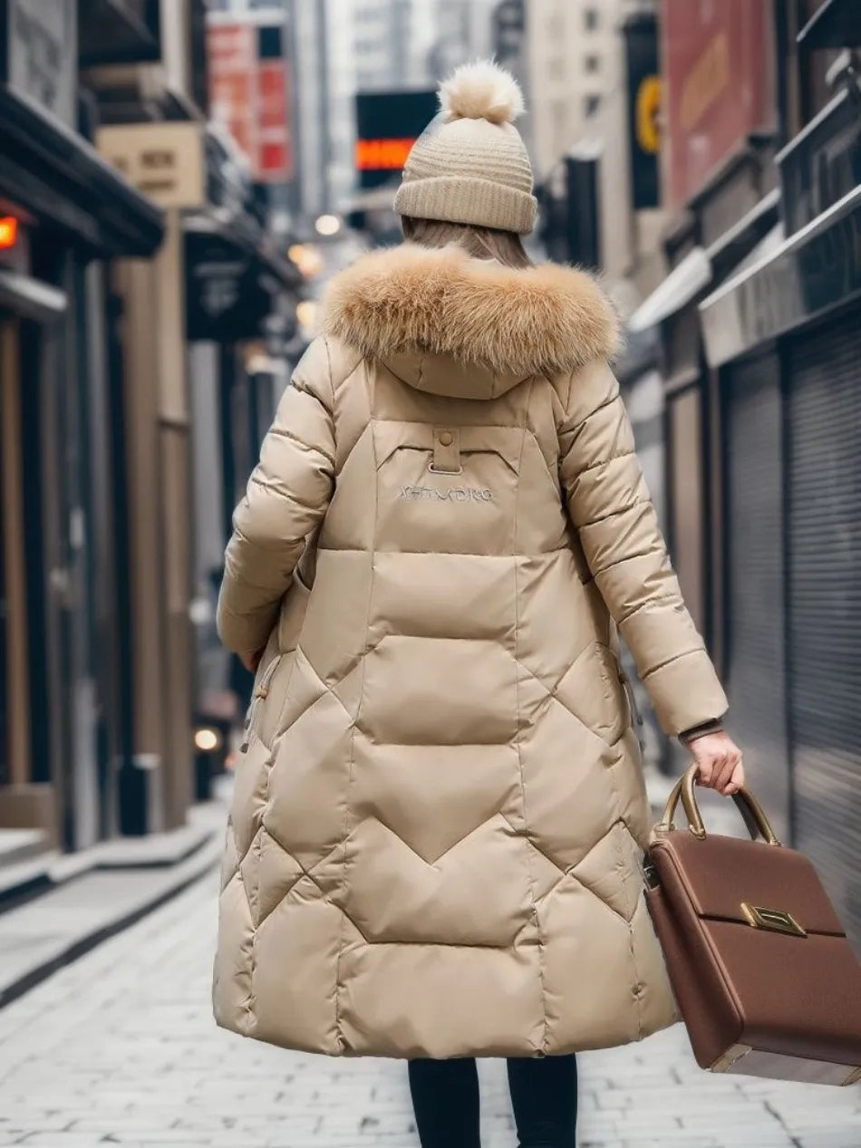 Doudoune femme longue à col en fausse fourrure amovible cintrée 15