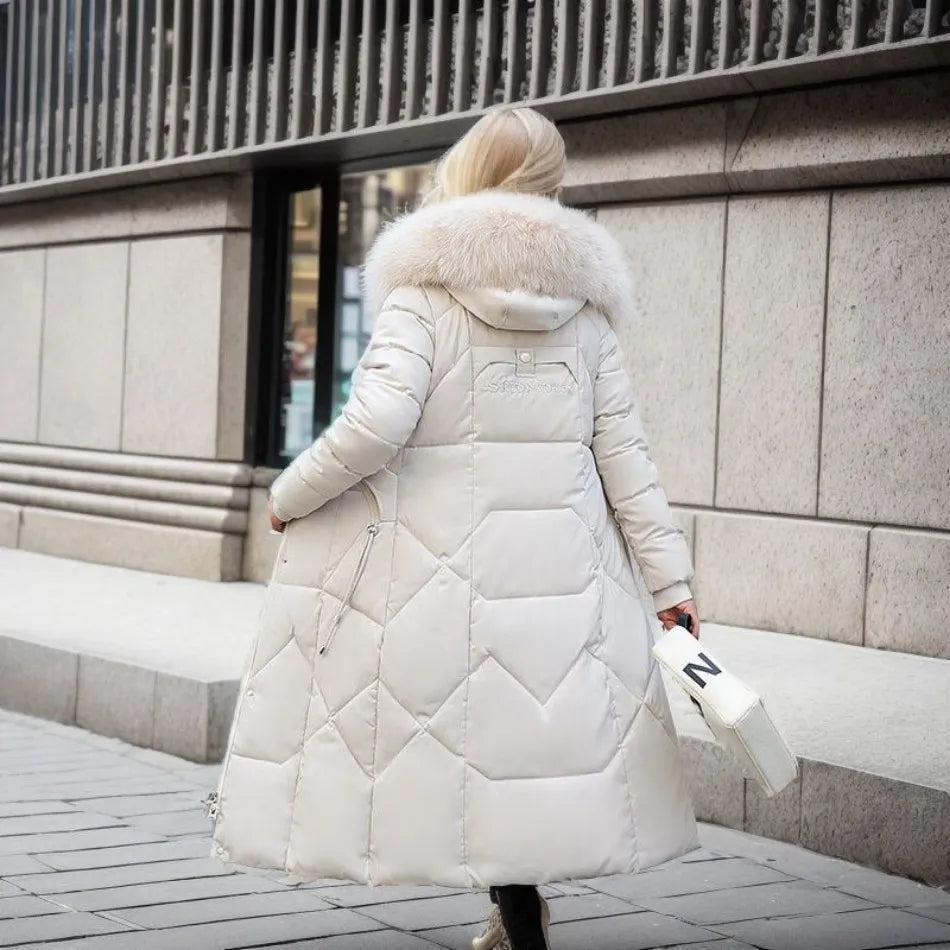 Doudoune femme longue à col en fausse fourrure amovible cintrée 8