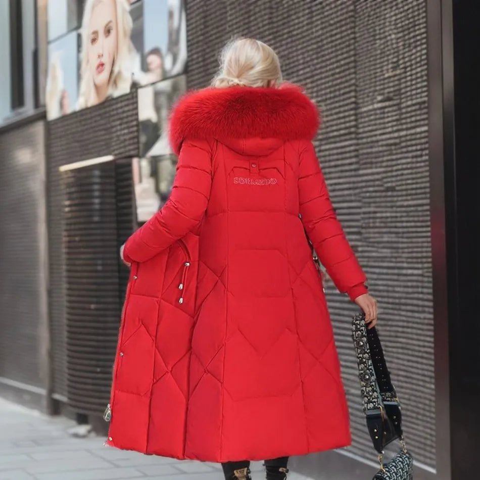 Doudoune femme longue à col en fausse fourrure amovible cintrée 9