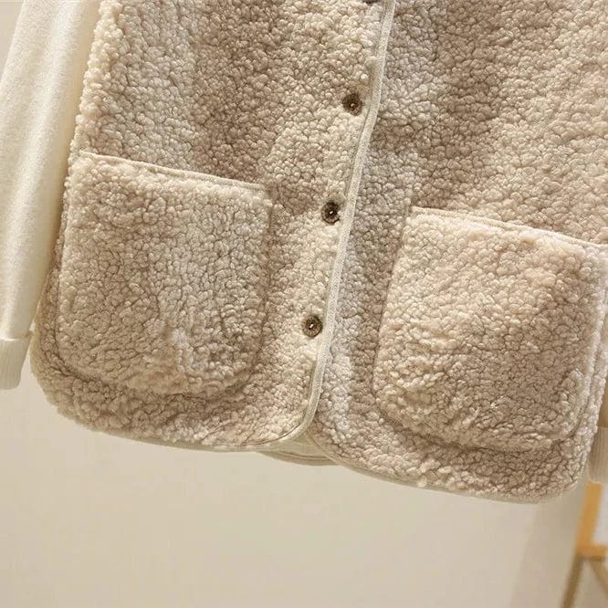 Gilet femme sans manches boutonné à poches et coupe droite 8