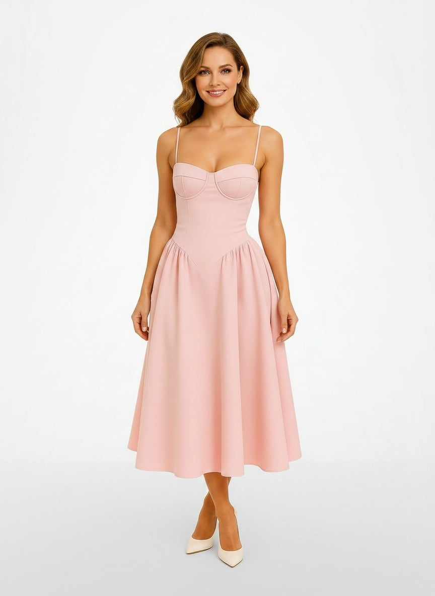 Full body view of the model wearing Robe midi rose avec corset et coupe A femme