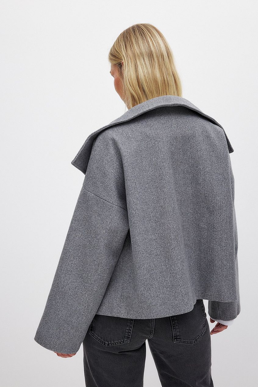 Manteau court femme croisé oversize à grand revers 10