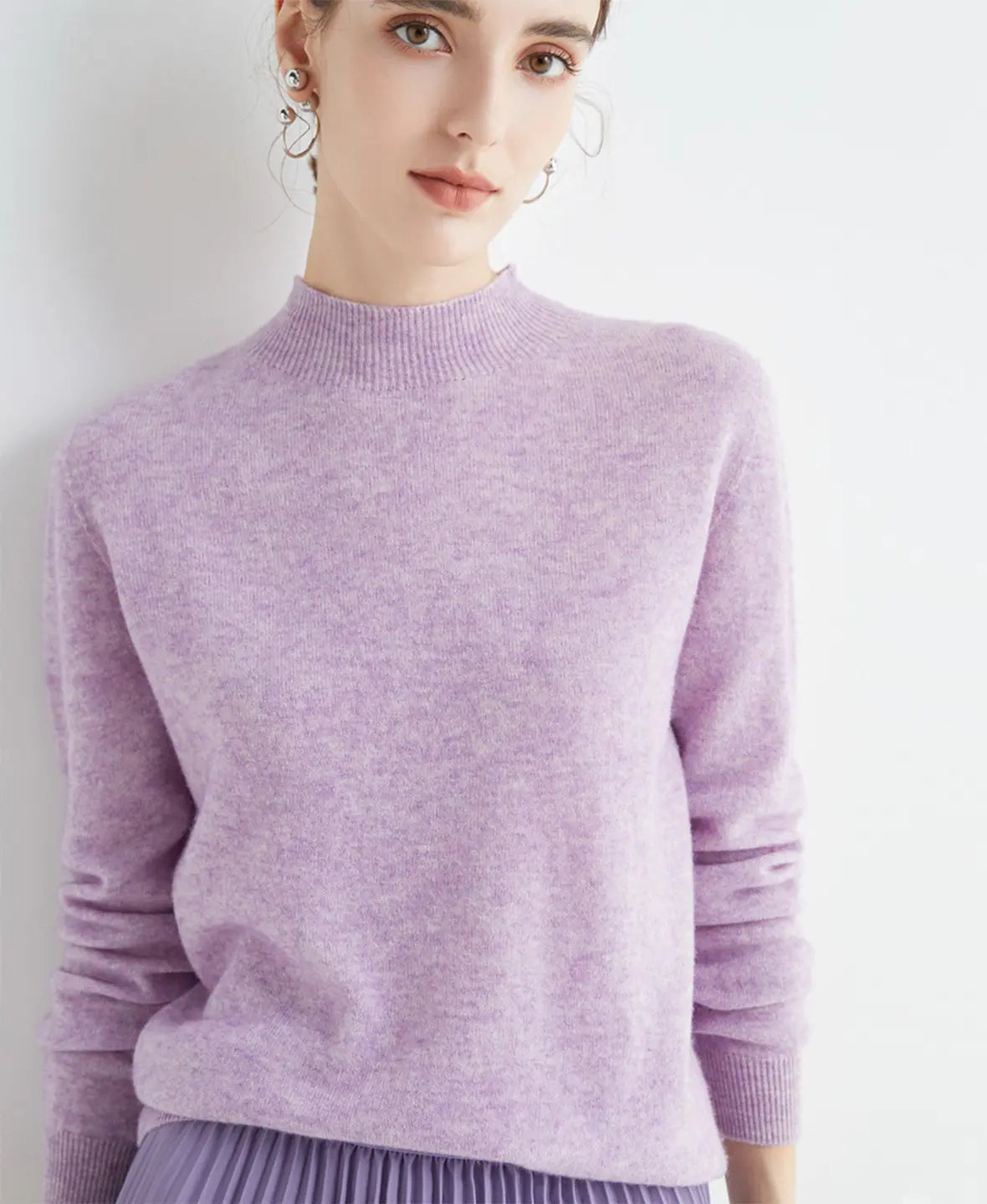 Pull femme en laine mérinos à col montant 11