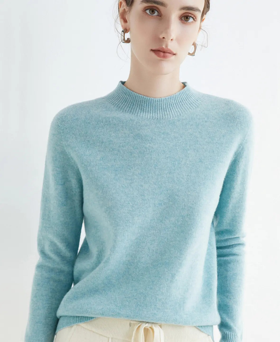 Pull femme en laine mérinos à col montant 12