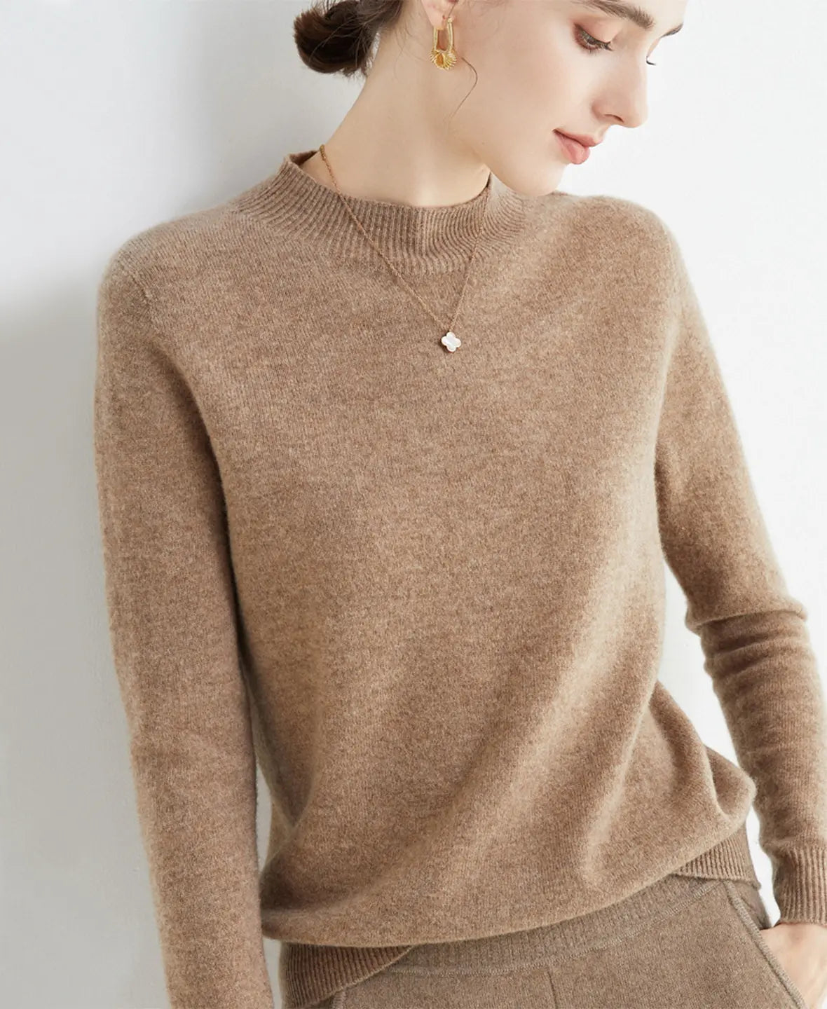 Pull femme en laine mérinos à col montant 16
