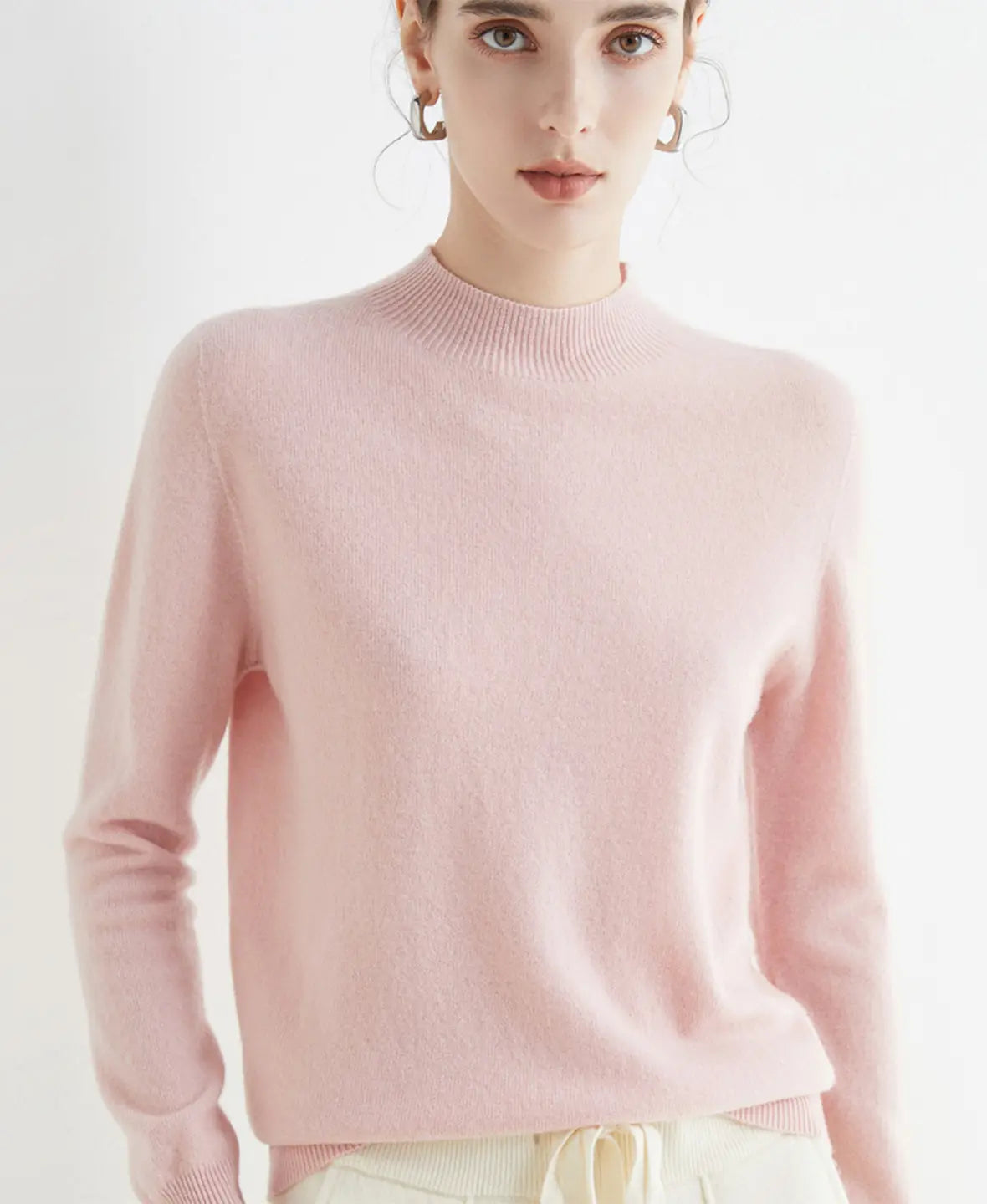 Pull femme en laine mérinos à col montant 9