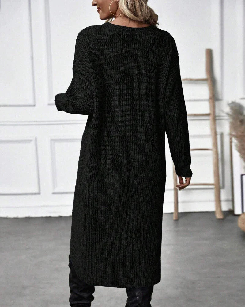 Pull long femme en maille côtelée à col rond et fente devant 11