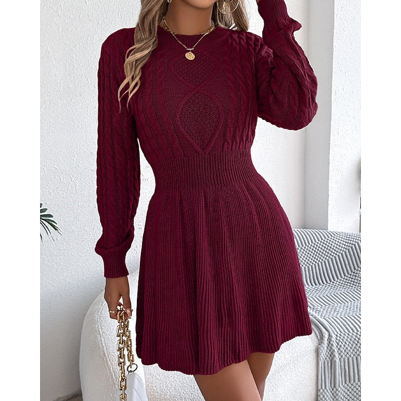 Robe pull courte en maille torsadée taille marquée et jupe évasée 10