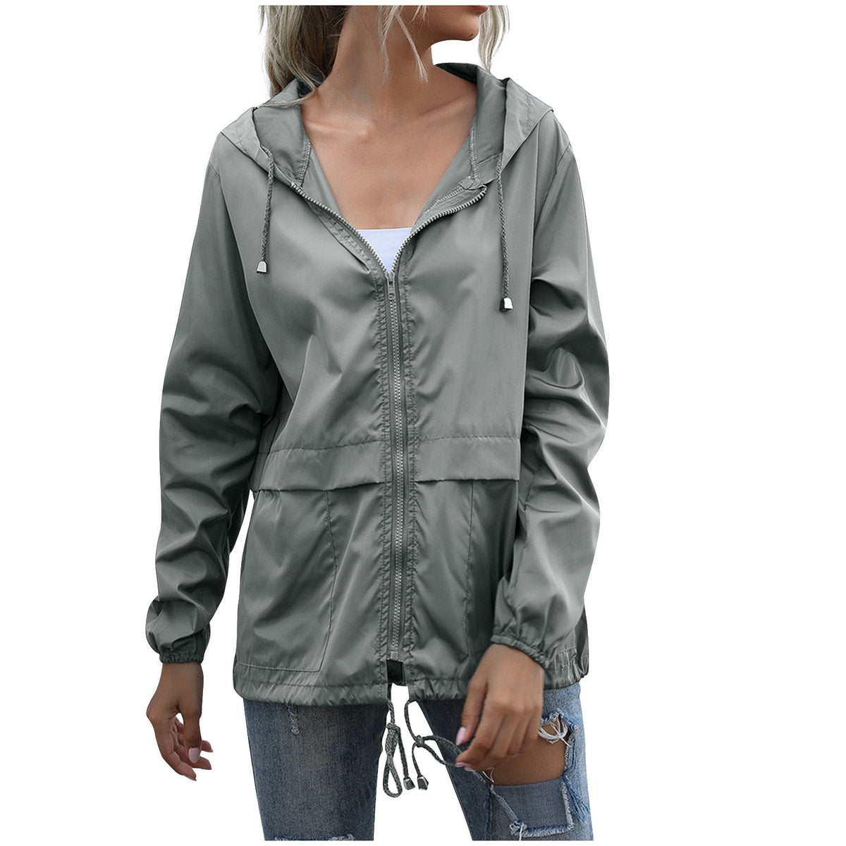 Veste de pluie femme légère et déperlante à capuche avec poches plaquées 2