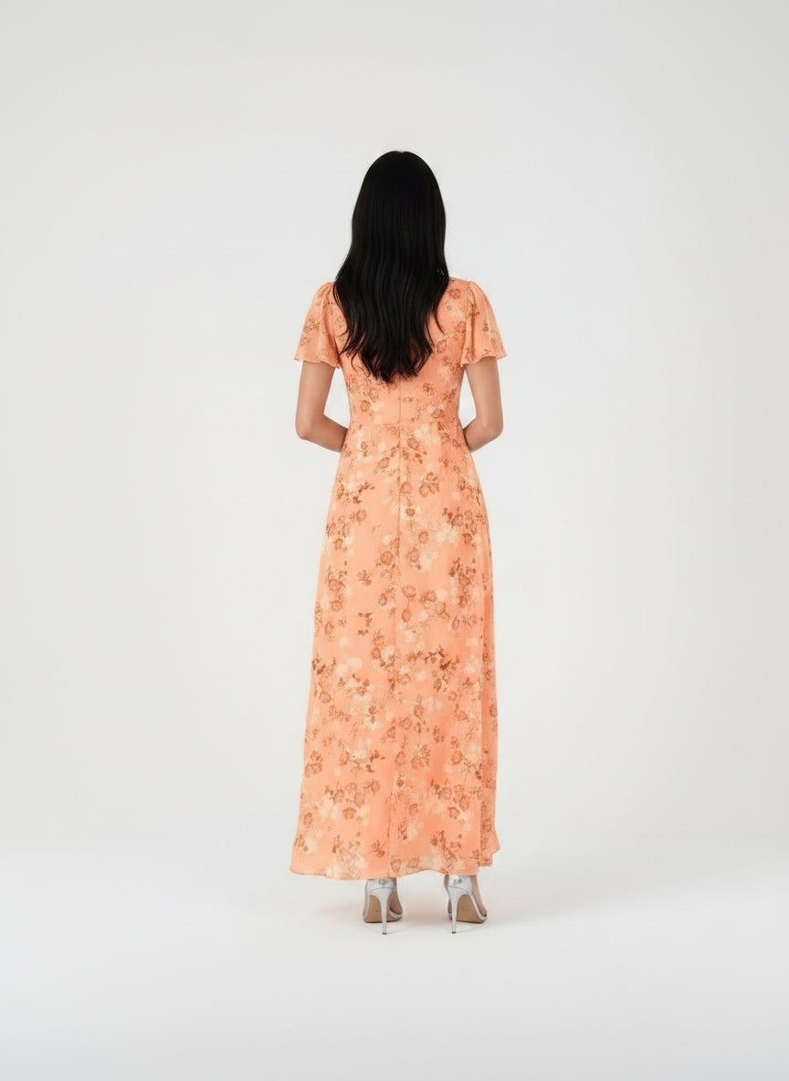 Back pose of the model wearing Robe d'été maxi formelle à imprimé floral femme