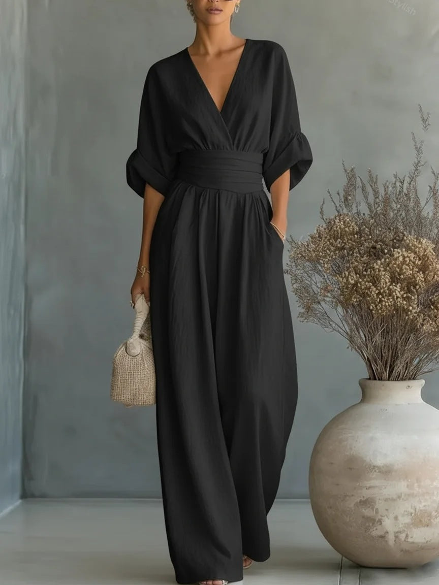 Combinaison femme chic col en V jambes larges coupe fluide manches courtes élégante