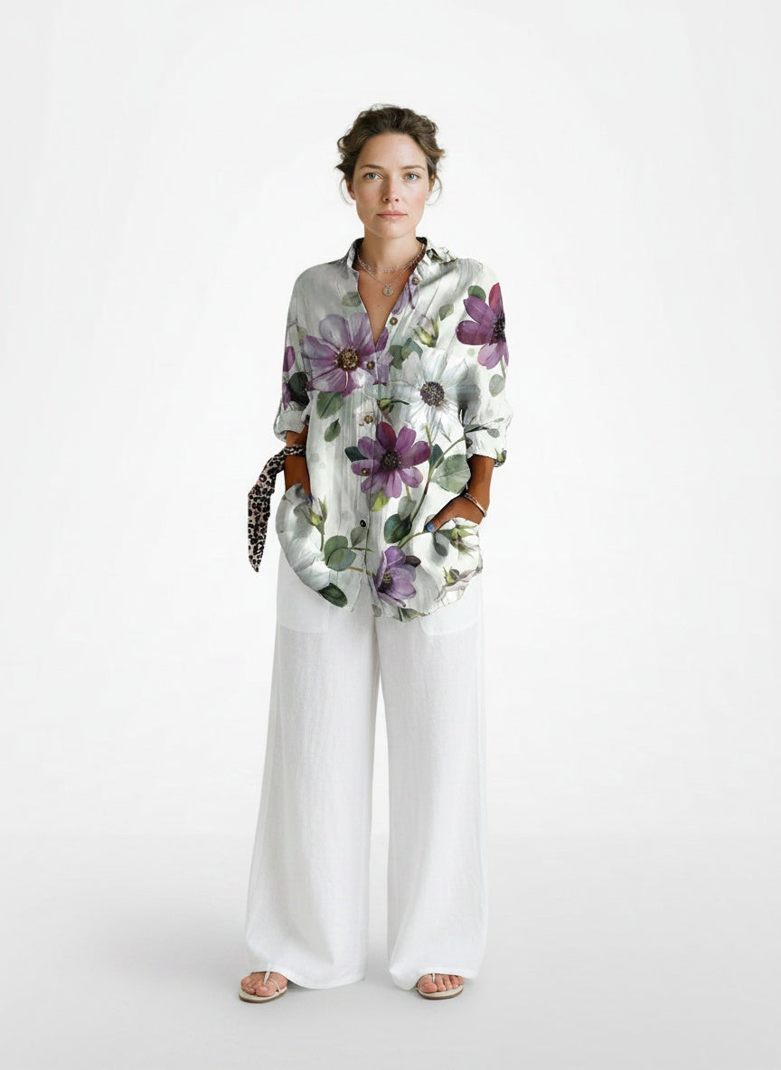 Full body view of the model wearing Blouse élégante boutonnée à manches longues femme