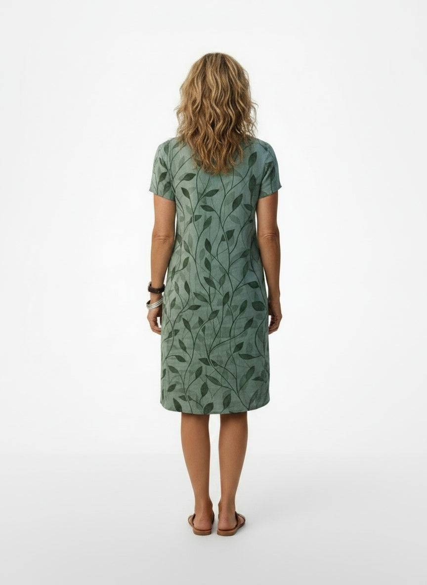 Back pose of the model wearing Robe midi à col en V et imprimé femme