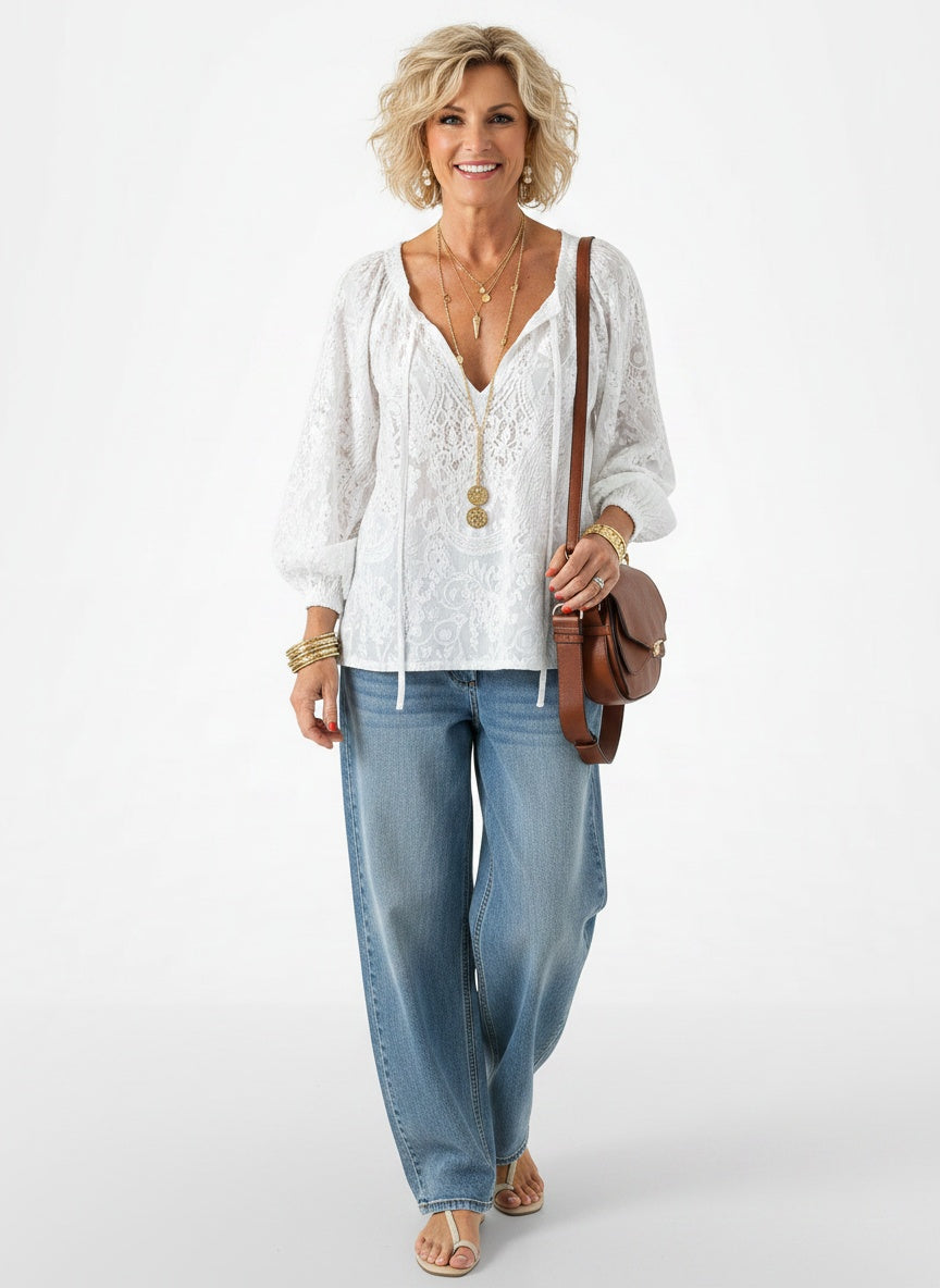 Full body view of the model wearing Blouse bohème à col fendu et style vintage femme