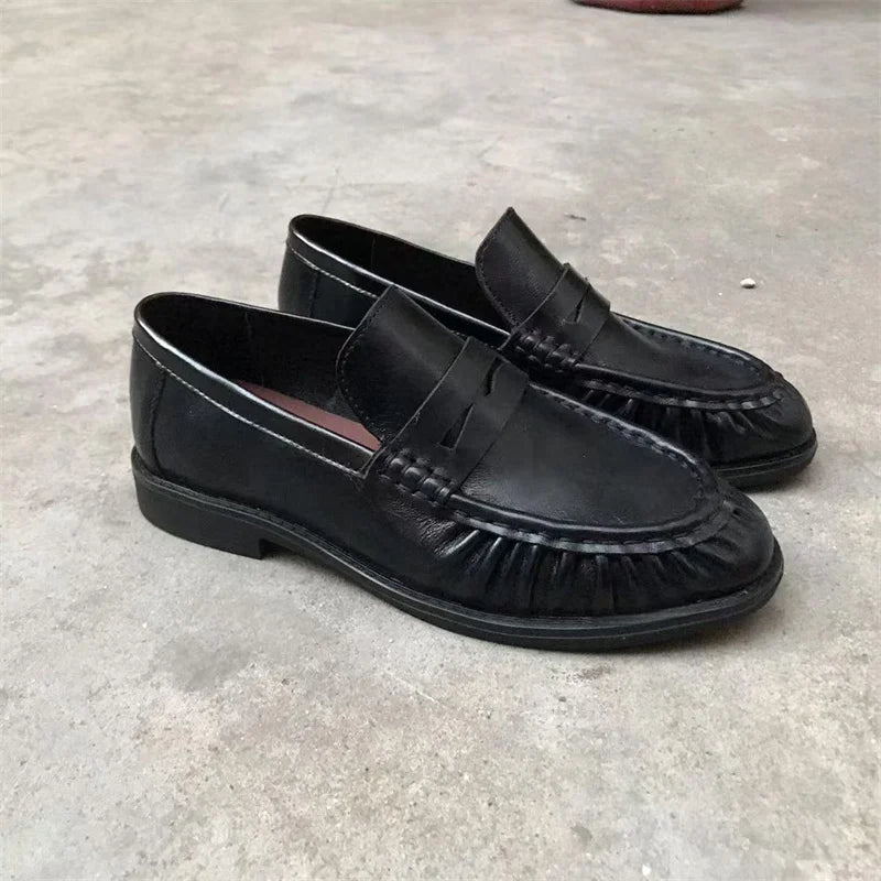 Mocassins femme effet daim à bride et détails plissés 6