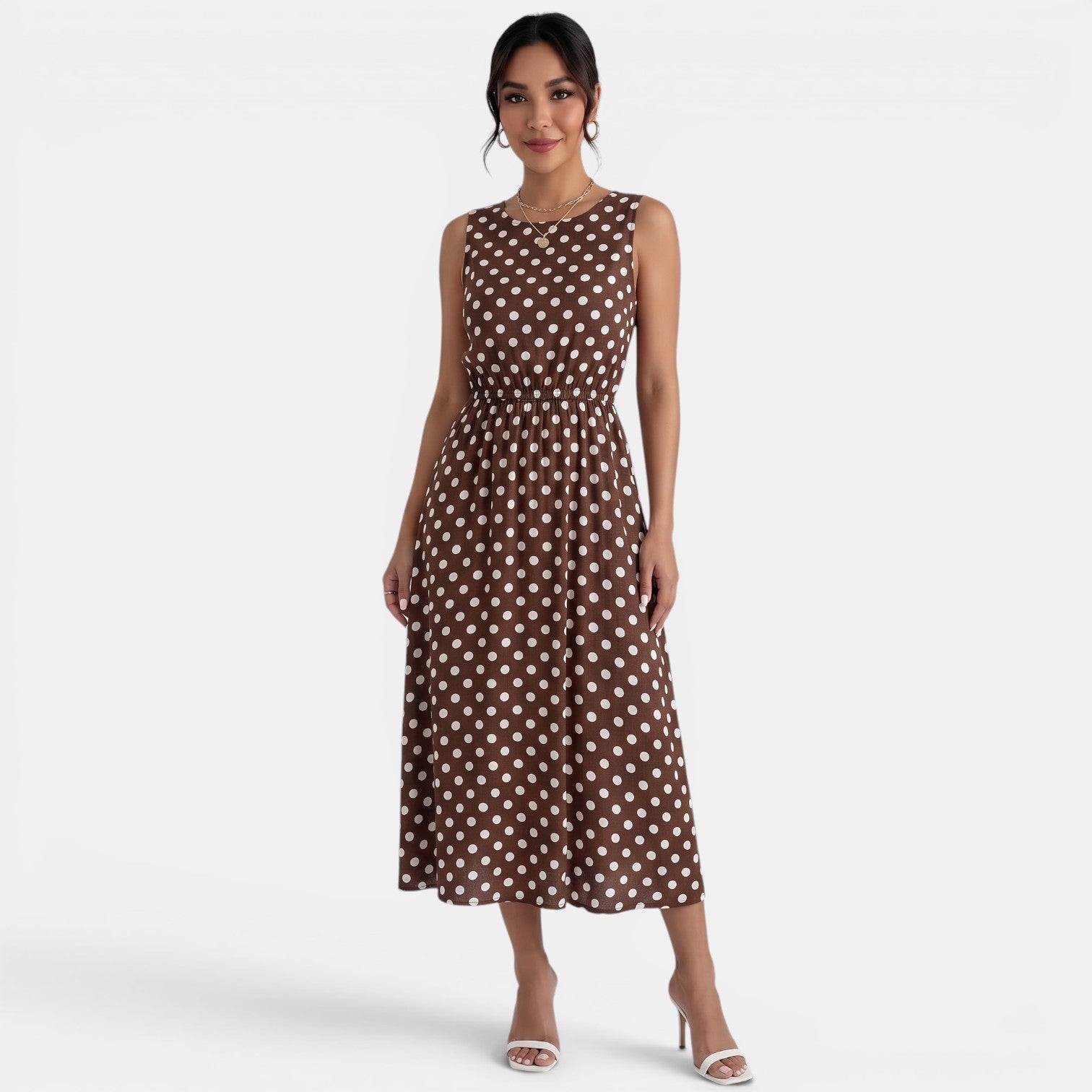 Robe midi à pois d'été sans manches à col rond et coupe trapèze