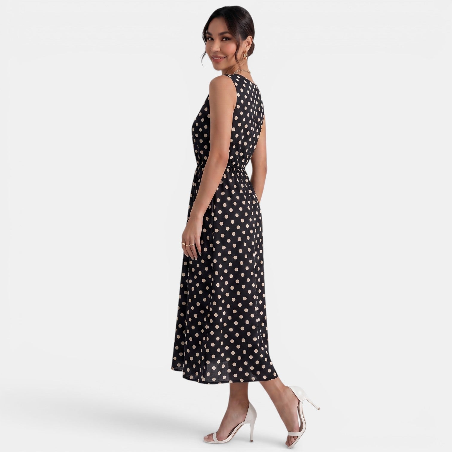 Robe midi à pois d'été sans manches à col rond et coupe trapèze
