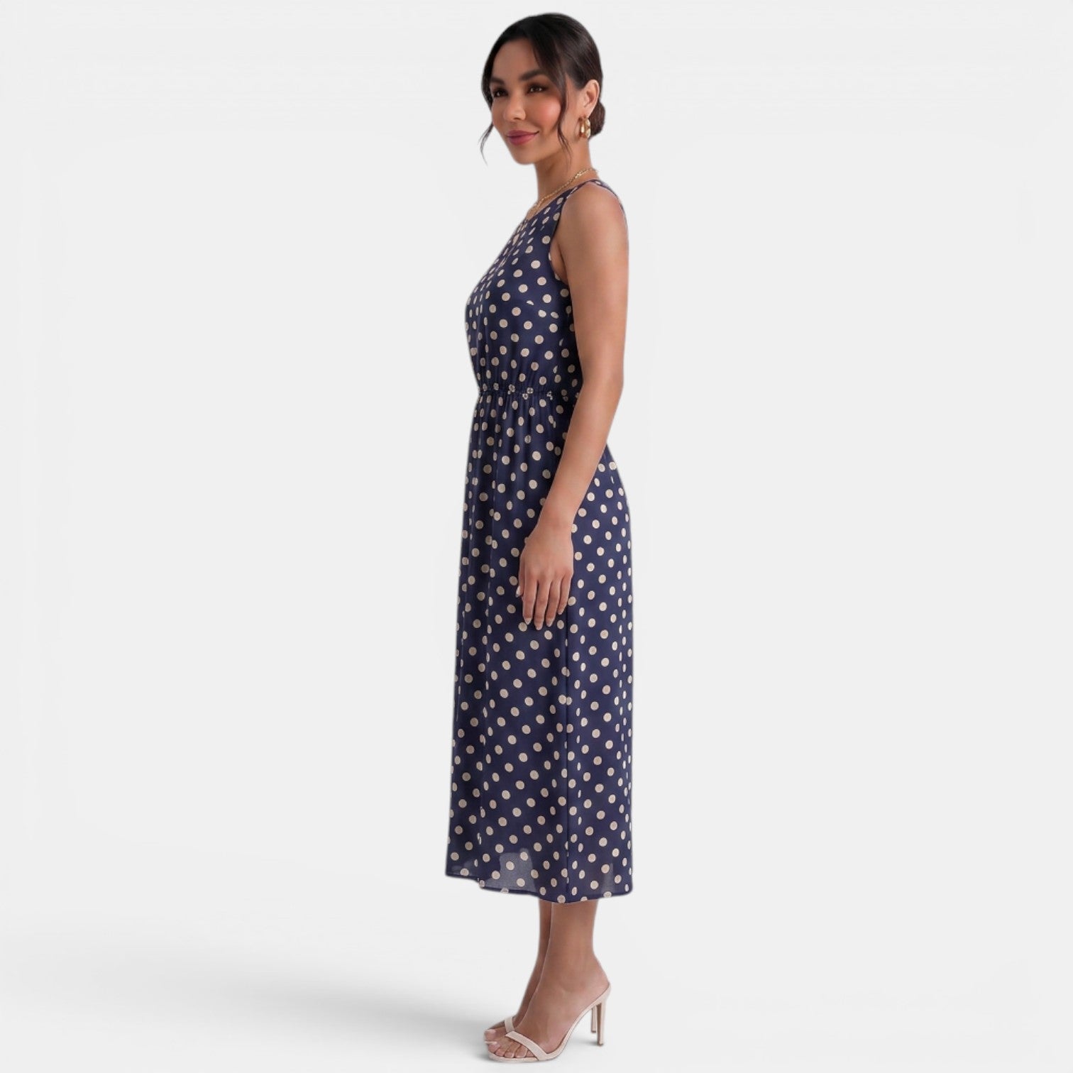 Robe midi à pois d'été sans manches à col rond et coupe trapèze