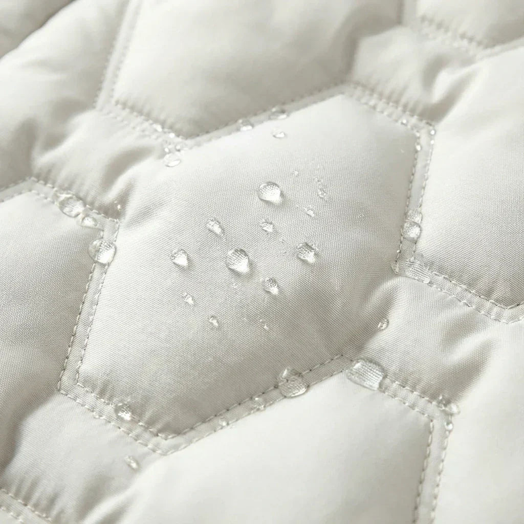 Doudoune femme longue à capuche cintrée matelassée 6