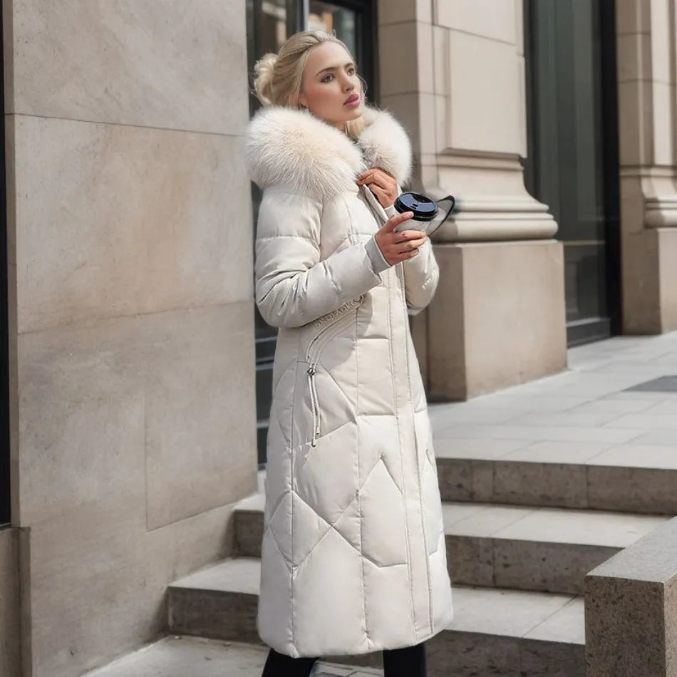 Doudoune femme longue à col en fausse fourrure amovible cintrée 1
