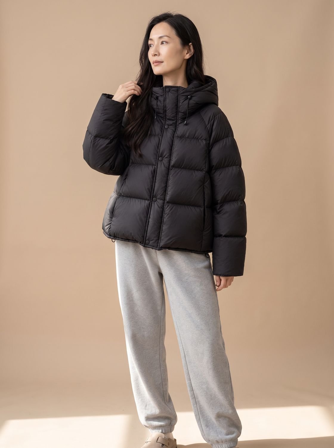 Doudoune femme oversize en duvet à capuche ajustable 1