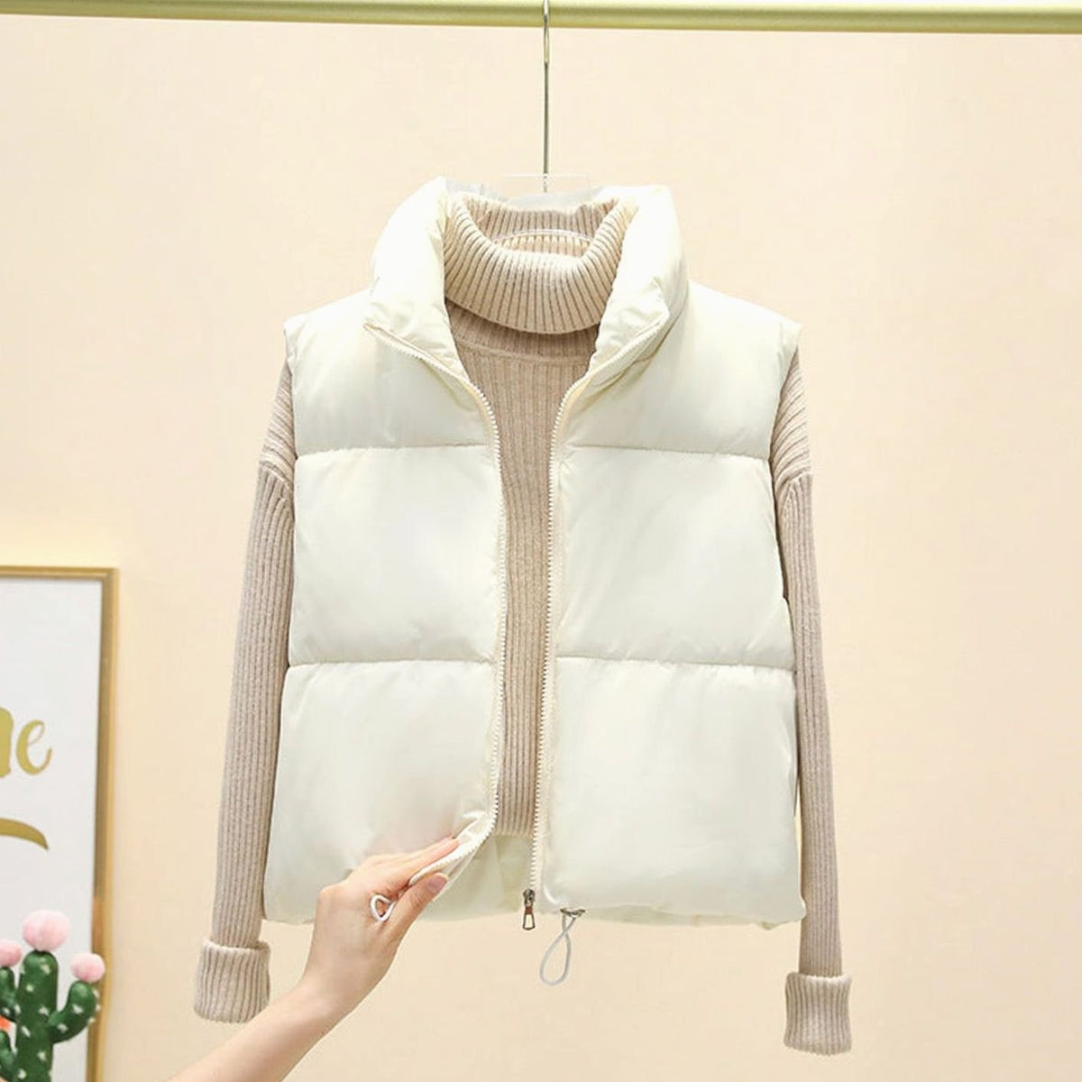 Doudoune sans manches femme courte col montant zip double sens ourlet à cordon 1