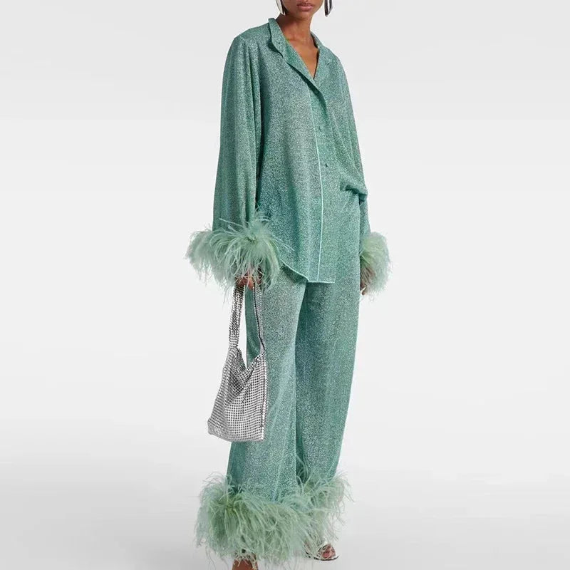 Ensemble deux pièces femme effet brillant à plumes et jambe large 2