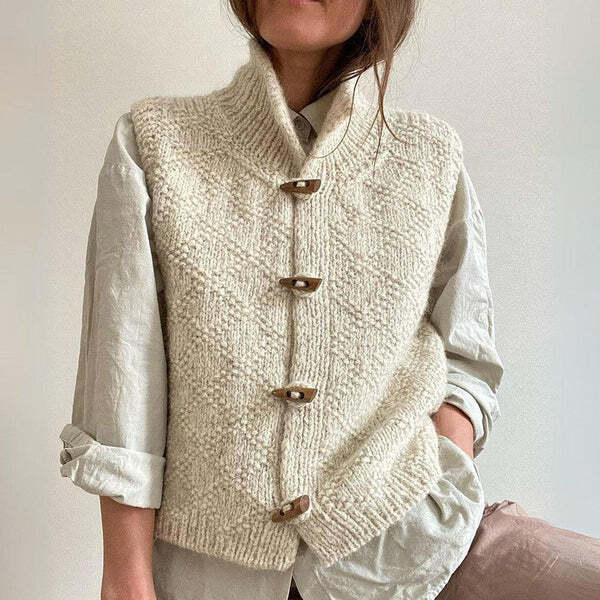Gilet femme en maille structurée à col montant, chaud et minimaliste 1
