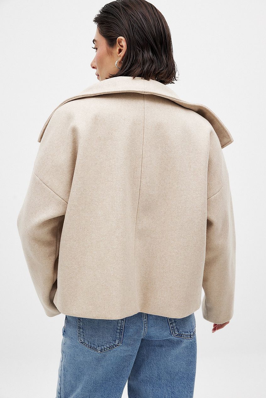 Manteau court femme croisé oversize à grand revers 8