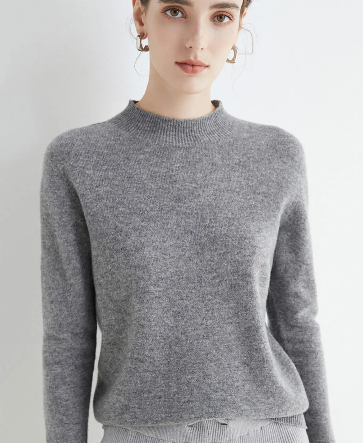 Pull femme en laine mérinos à col montant 13