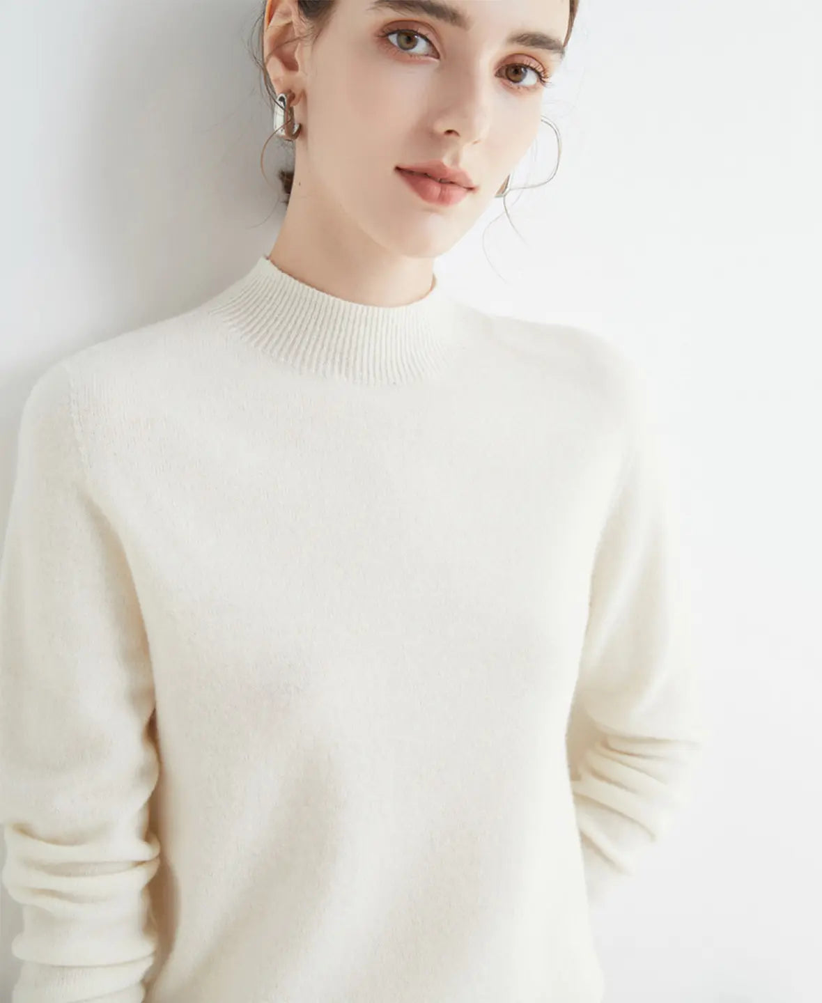 Pull femme en laine mérinos à col montant 14