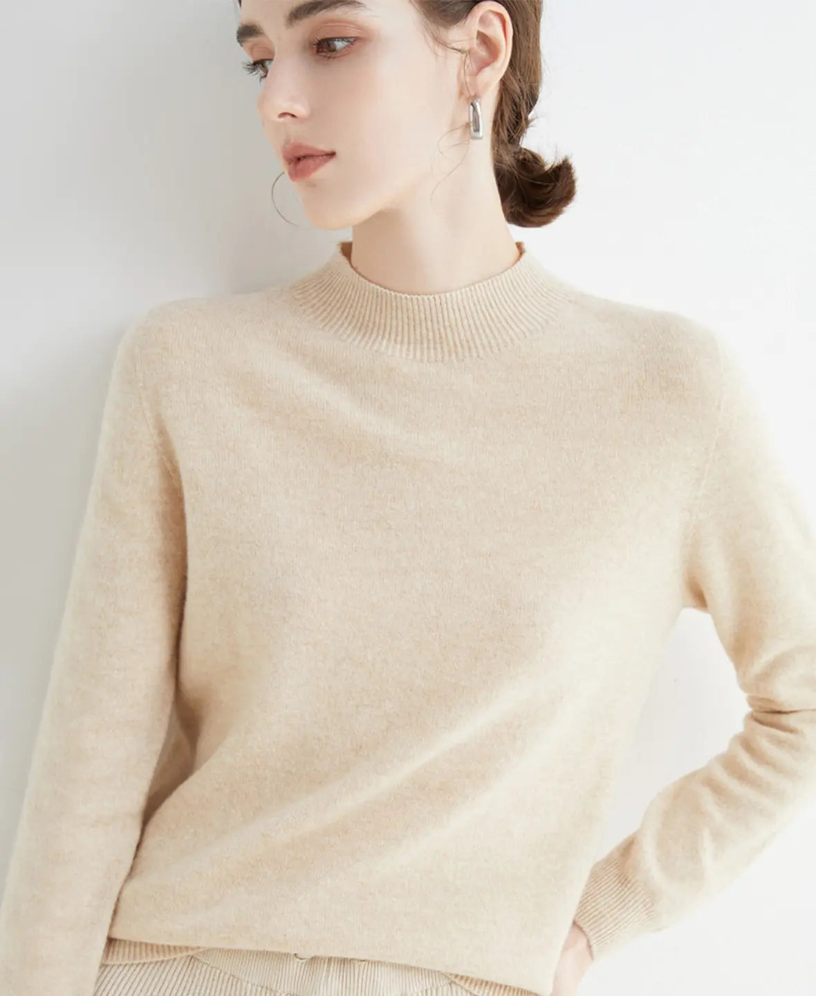Pull femme en laine mérinos à col montant 17