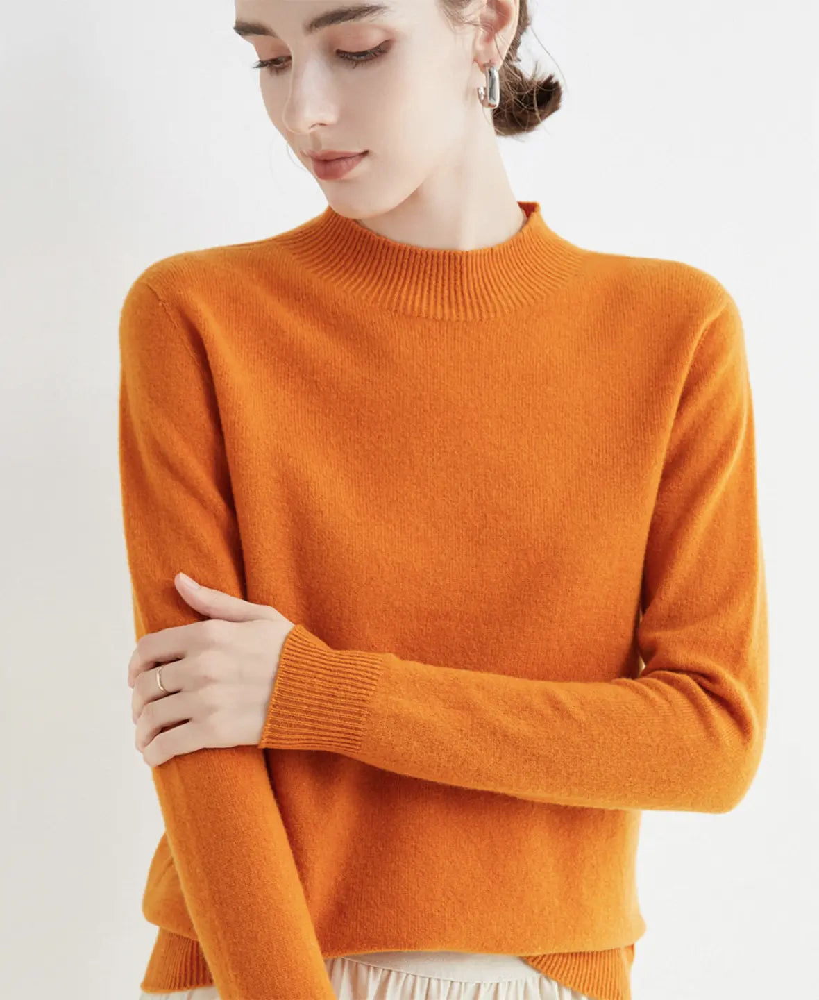 Pull femme en laine mérinos à col montant 19