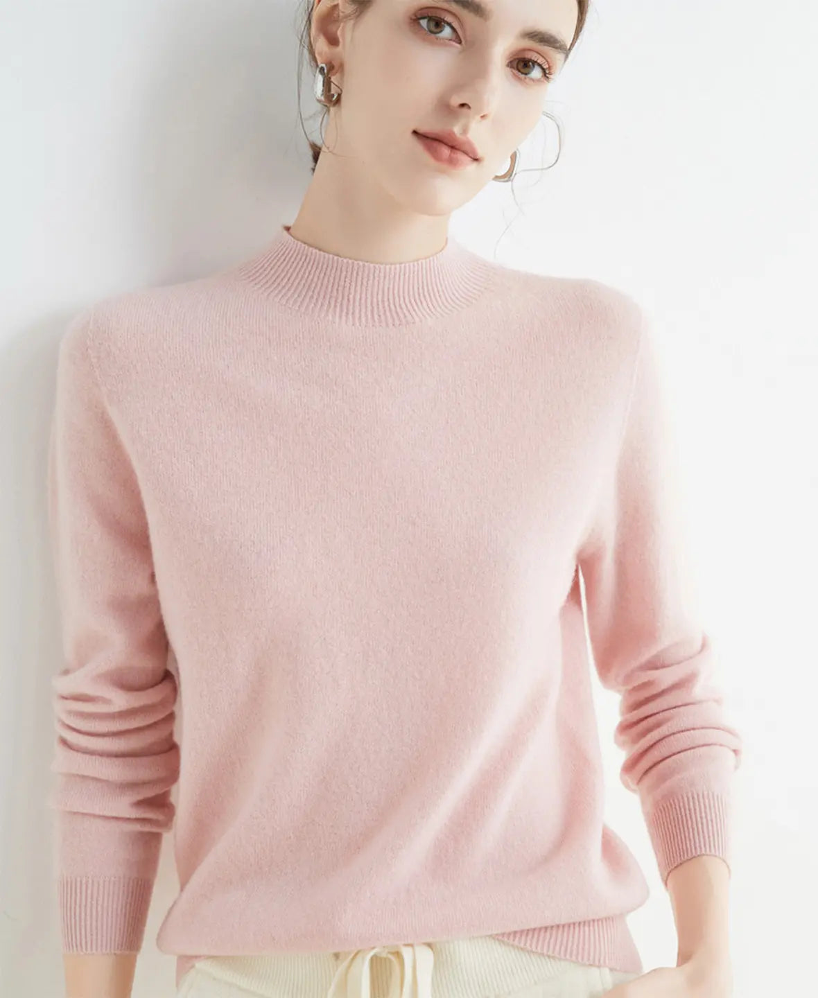 Pull femme en laine mérinos à col montant 21
