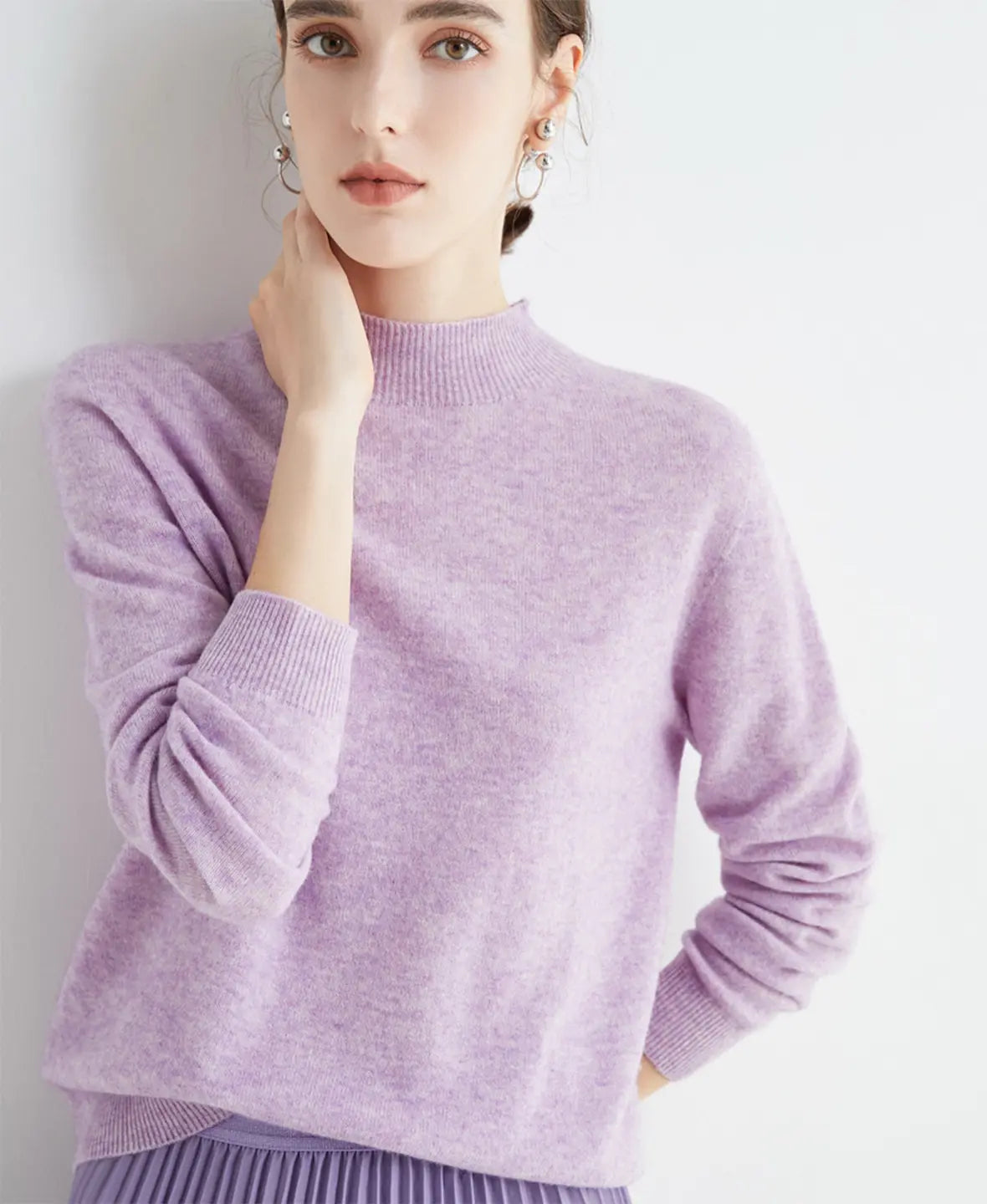 Pull femme en laine mérinos à col montant 23