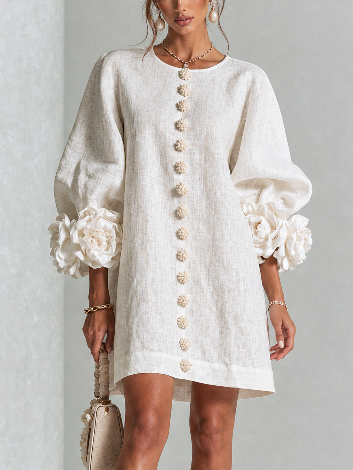 Robe élégante trapèze à manches 3/4 et poignets noués fleuris 1
