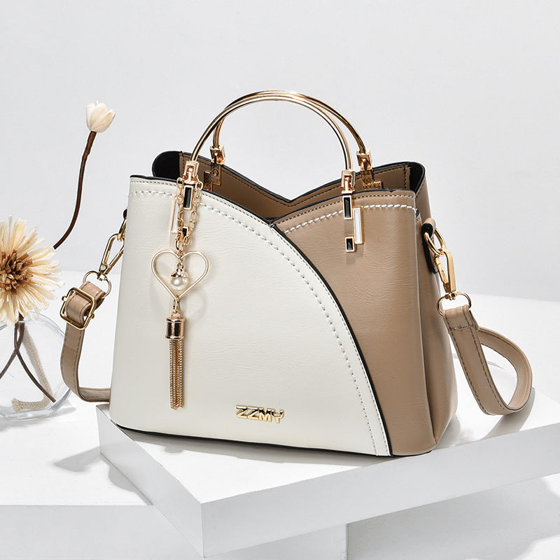 Sac à main femme en cuir compact avec bandoulière réglable 1