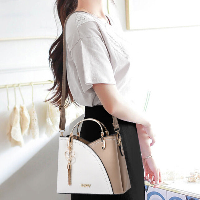 Sac à main femme en cuir compact avec bandoulière réglable 8