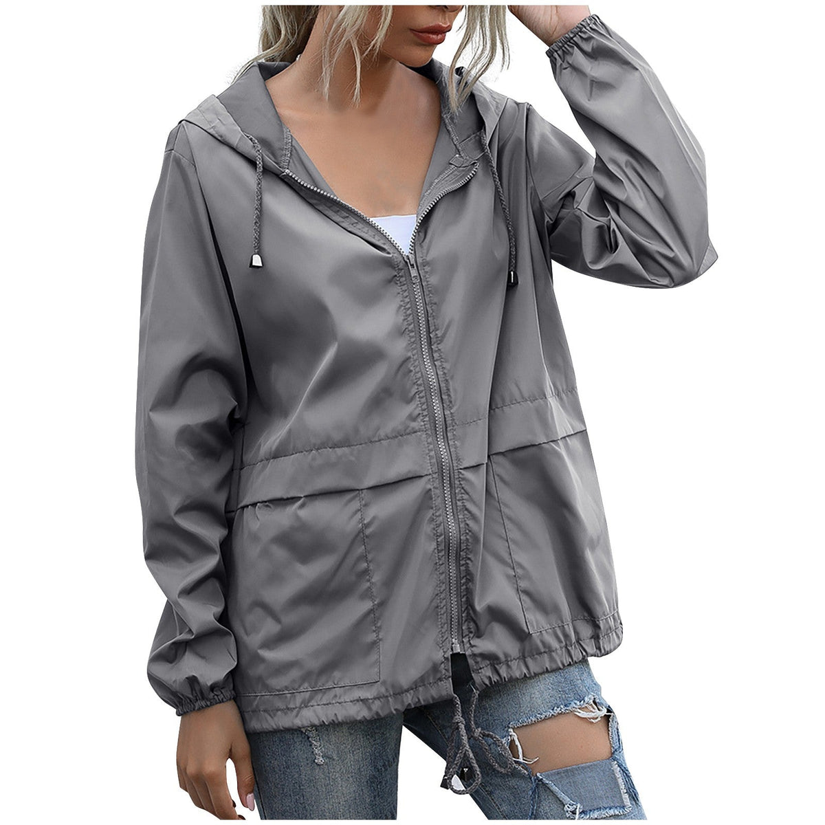 Veste de pluie femme légère et déperlante à capuche avec poches plaquées 3